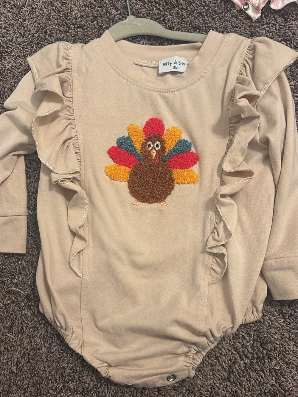 Abby & Evie Beige Ruffle Turkey Long-Sleeve One-Piece - Kids